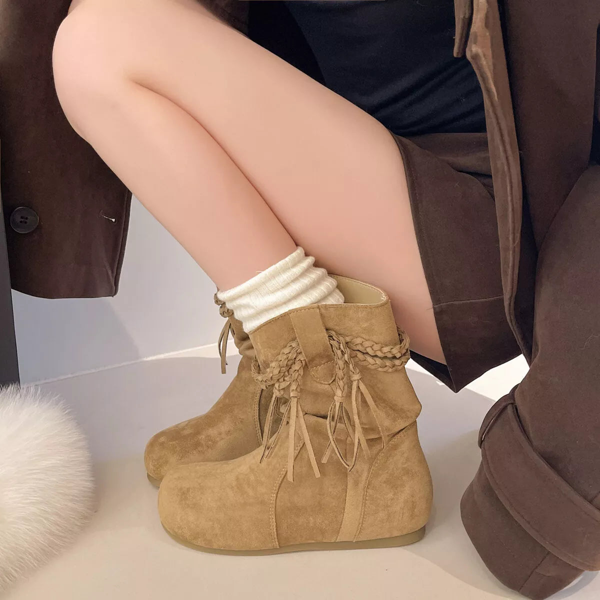 Bottes à bout rond en suède à franges