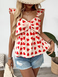 Peplum-Bluse mit Herzprint und Schleife vorne