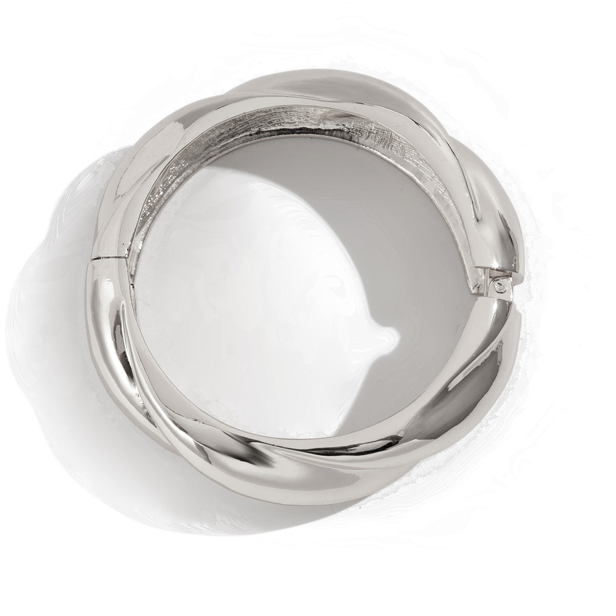 Fortschrittliches, rundes, glattes Federarmband mit modischem unregelmäßigem Metallic-Gefühl