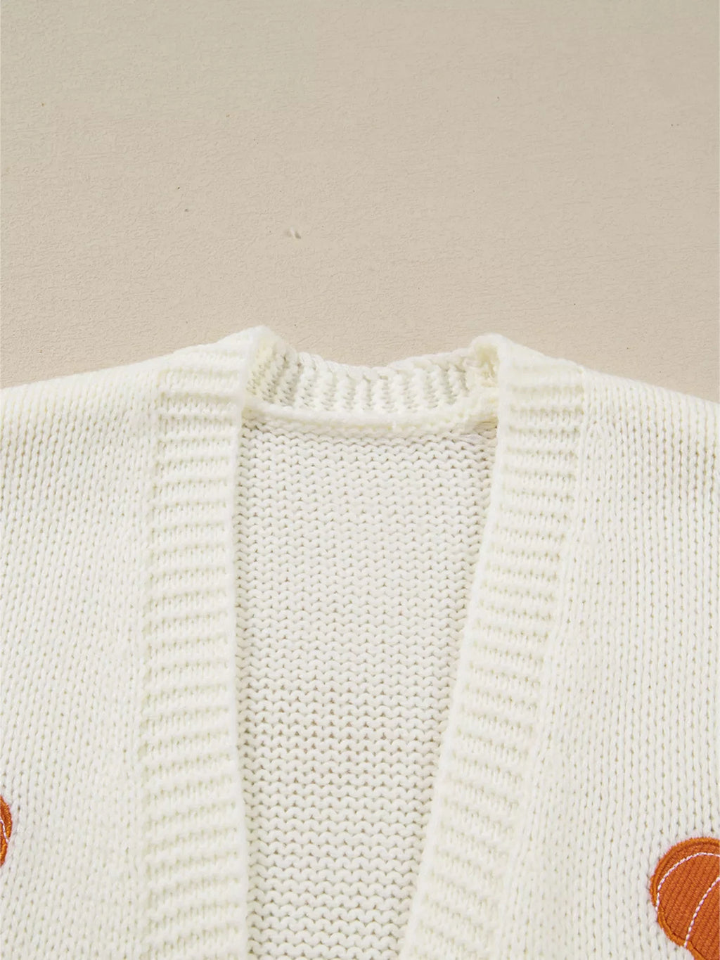 Cardigan tricoté brodé citrouille d'Halloween