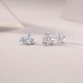 Waves-Set mit Moissanit 0.3 Karat S925 Sterlingsilber und platinbeschichtete Ohrstecker Modeschmuck Silberschmuck