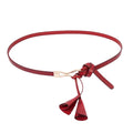 Ceinture fine en cuir à boucle en alliage rouge avec pampilles