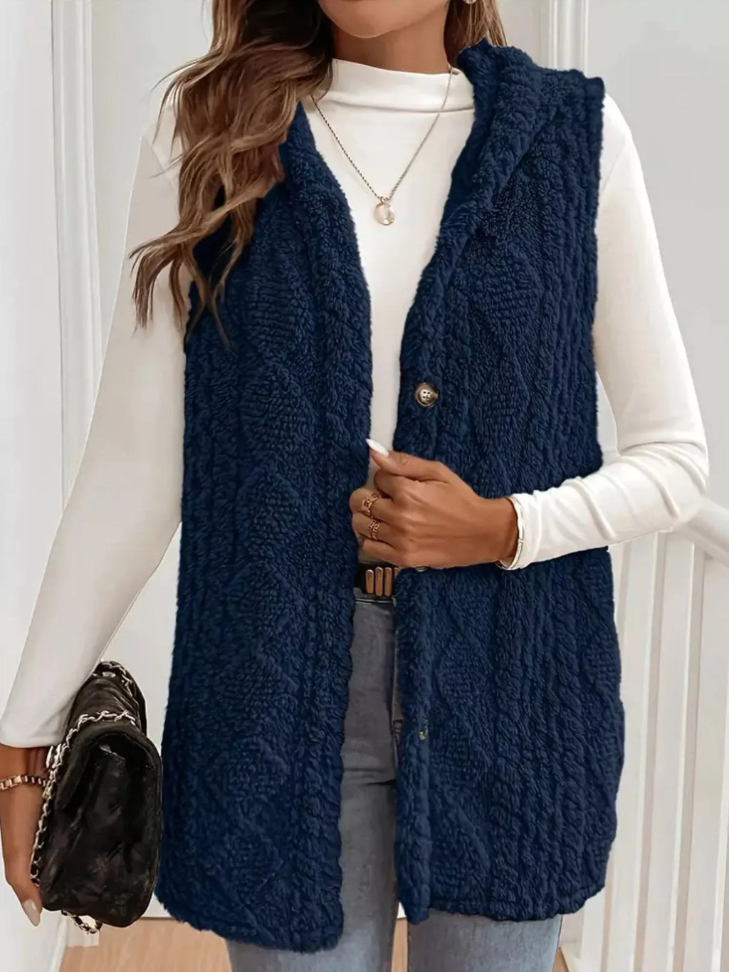 Manteau sans manches à capuche en sherpa boutonné